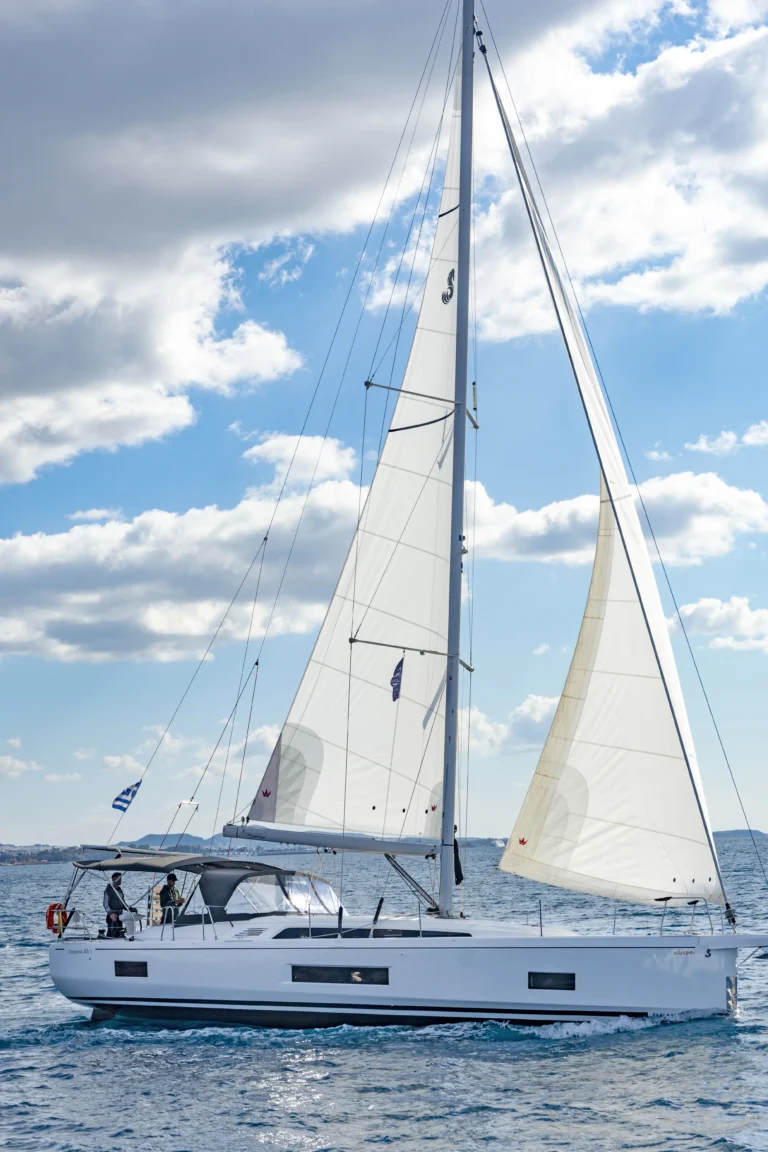 Beneteau Oceanis 46.1 sailing yacht under sail in open sea, yacht charter in Greece