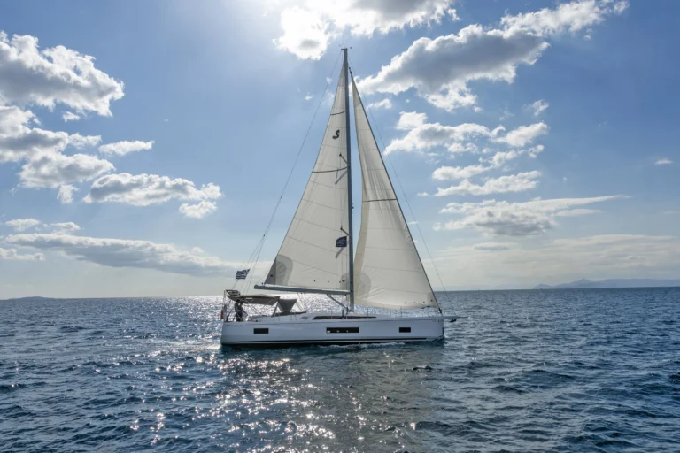 Beneteau Oceanis 46.1 - starboard-side view under sail on the open sea | Sailing To Go, sailing yacht charter in Greece
