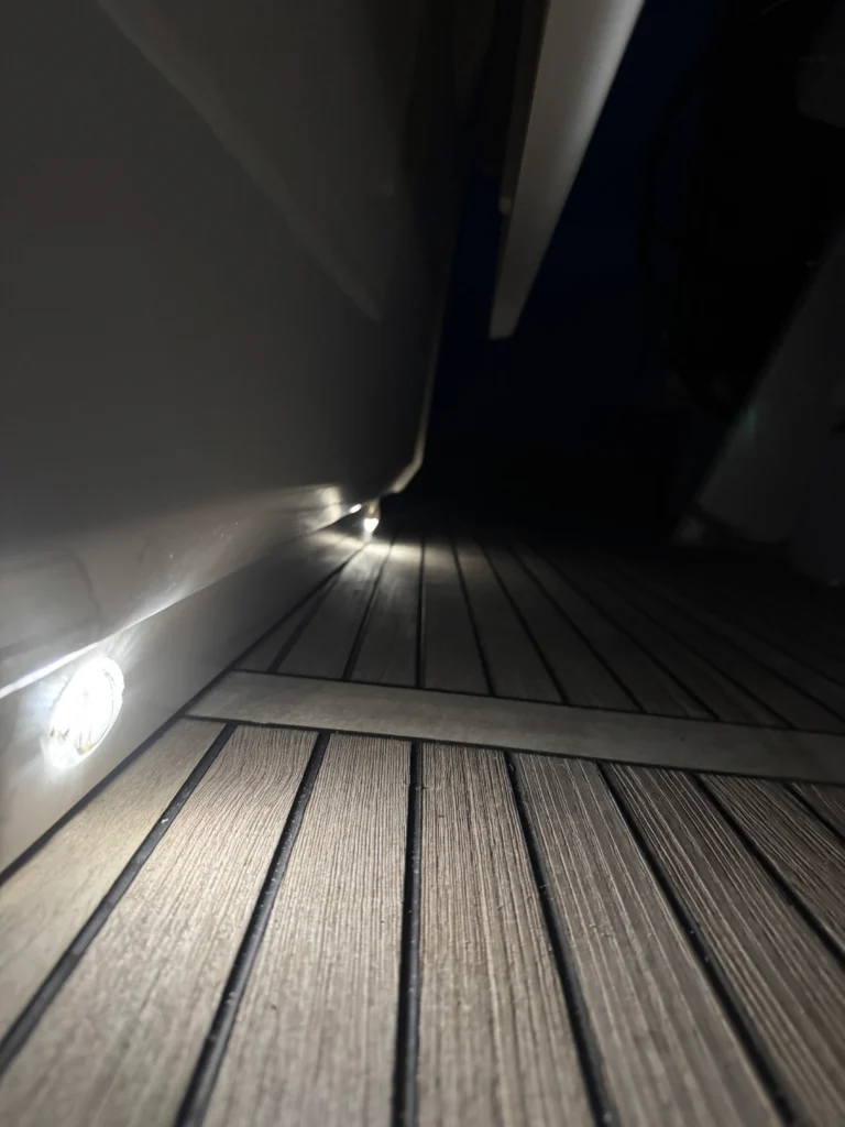Beneteau Oceanis 46.1 - cockpit teak deck LED lighting at night | Sailing To Go, yacht charter in Greece
