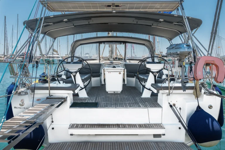 Beneteau Oceanis 46.1 - stern view with open swim platform in the marina | Sailing To Go, yacht charter in Greece
