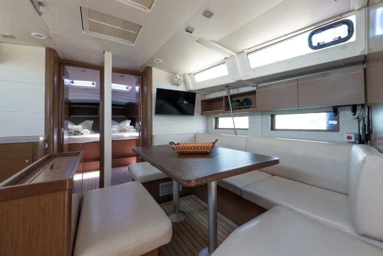 Beneteau Oceanis 46.1 - interior saloon with Smart TV, sailing yacht for charter in Greece.
