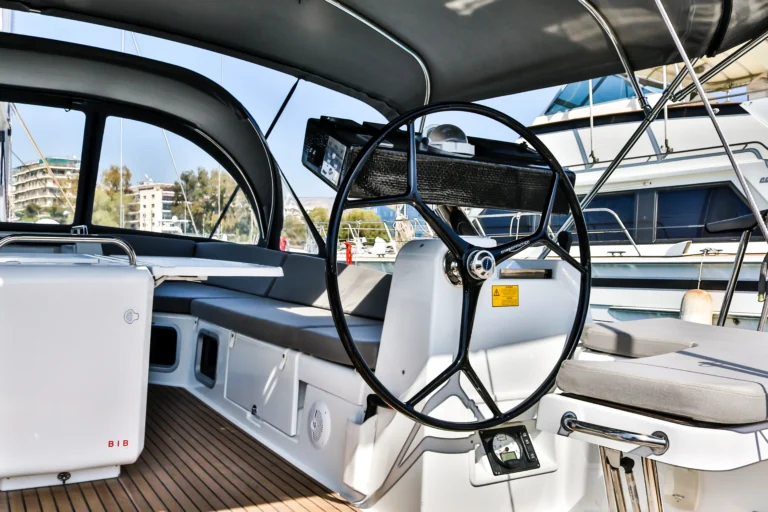 Jeanneau 54 Sea Force helm station with steering wheel and instruments, charter in Greece
