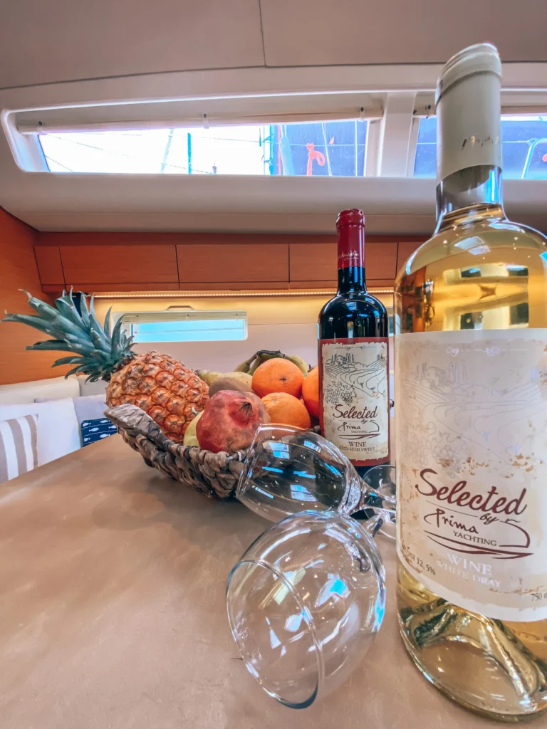 Jeanneau 54 Sea Force saloon table with dining details, yacht charter in Greece