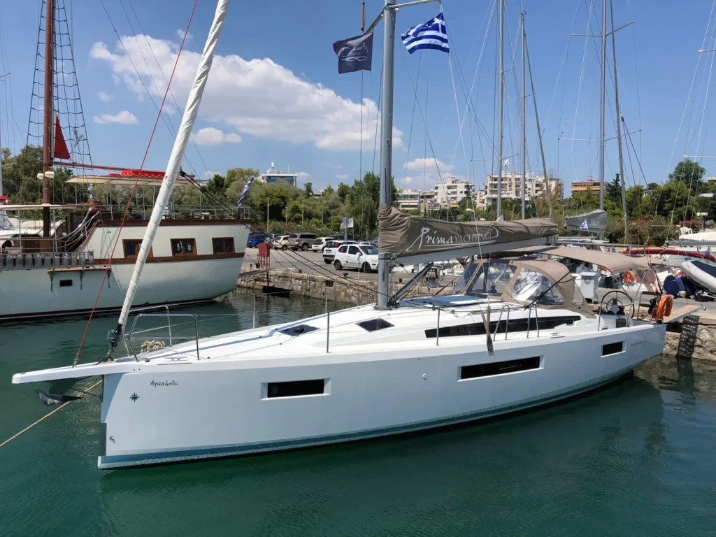 Jeanneau Sun Odyssey 410 Aquaholic at the dock, port-side view - yacht charter in Greece