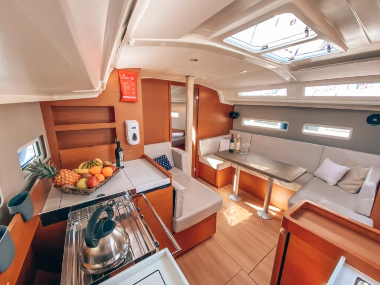 Jeanneau Sun Odyssey 410 Aquaholic interior saloon aft view for charter in Greece
