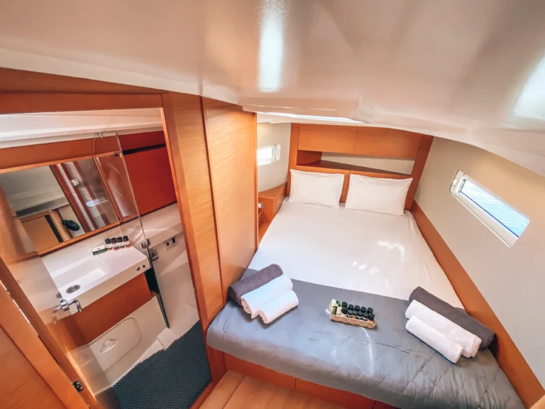 Jeanneau Sun Odyssey 410 Aquaholic forward cabin interior for charter in Greece