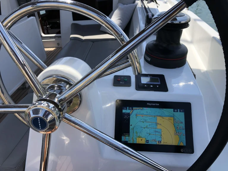 Jeanneau Sun Odyssey 410 Aquaholic helm station with navigation instruments, charter in Greece