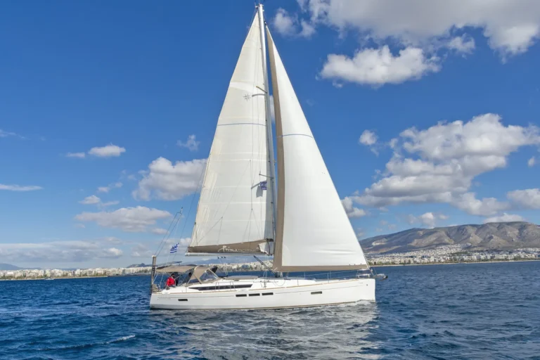 Jeanneau Sun Odyssey 509 Promise sailing yacht starboard side view for charter in Greece