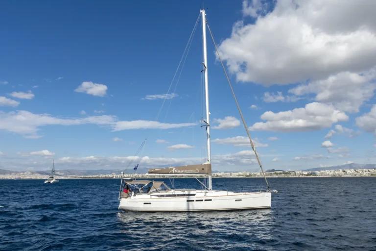 Jeanneau Sun Odyssey 509 Promise yacht starboard side at sea for charter in Greece