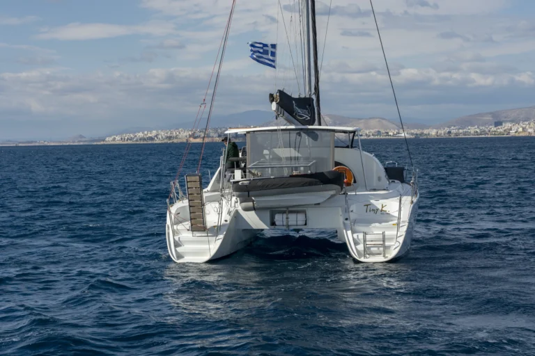 Lagoon 380 Tiny K aft view at sea, catamaran charter in Greece