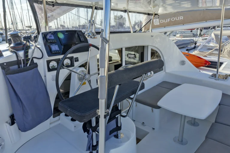 Lagoon 380 Tiny K cockpit with steering area, catamaran charter in Greece