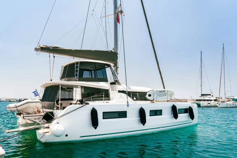 Lagoon 46 Sea Energy I exterior side view at the marina for catamaran charter in Greece