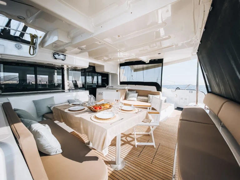 Lagoon 46 Sea Energy I cockpit dining area for catamaran charter in Greece